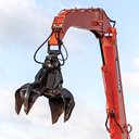 Doosan grapple attachment for material handlers.